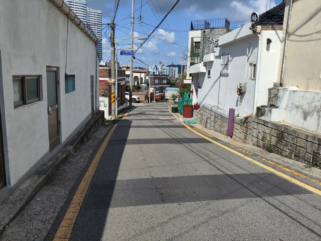 A back lane climbing through Mokpo's old quarter