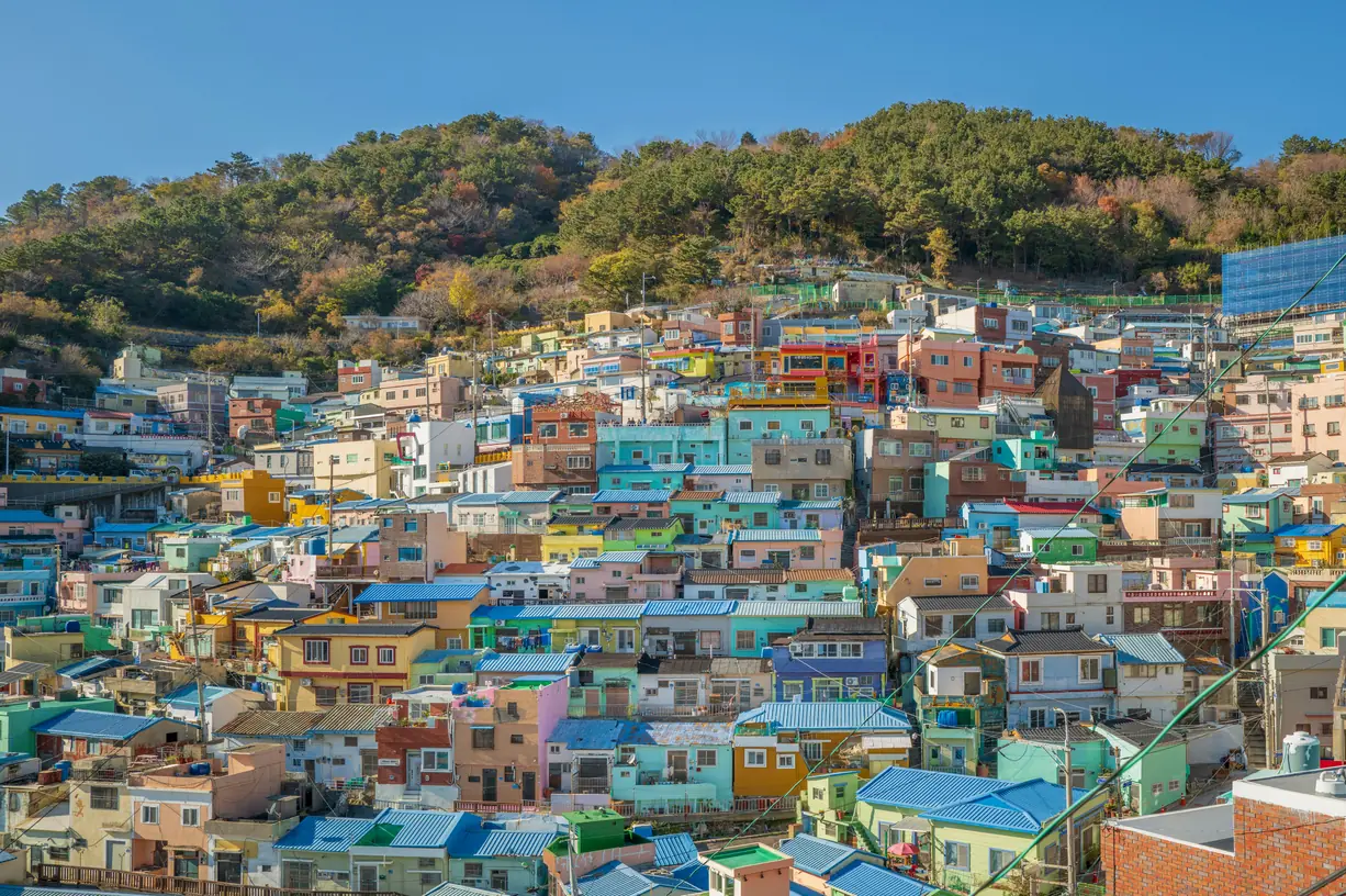 Painted houses stacked above Busan harbour